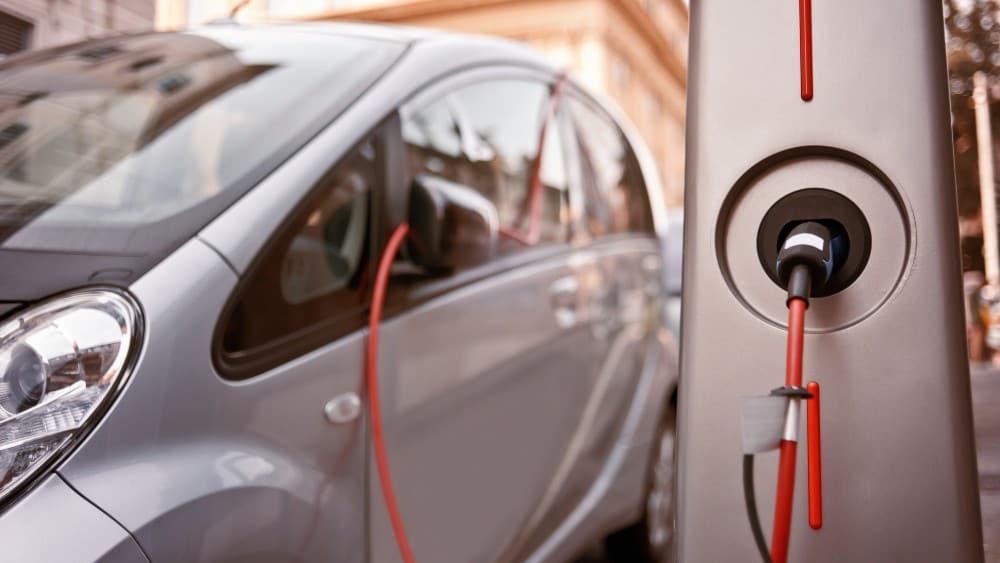 Electric car being charged 2 Lithium Stocks to Buy to Ride the EV Wave