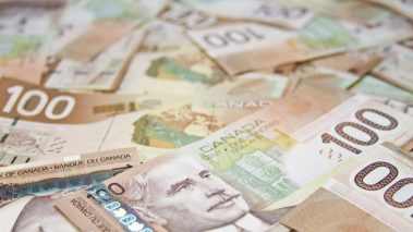Stack of dollars How to Double Your Passive Income in 2022