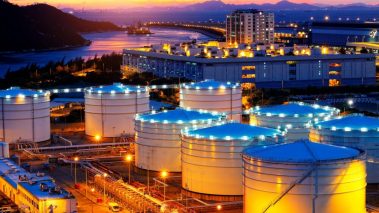 oil tank at night Is Vermilion (TSX:VET) a Buy for its Upcoming Dividend?