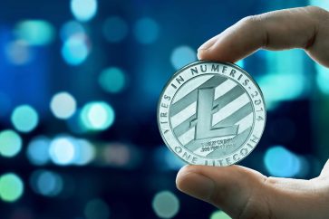 ltc in hand Litecoin price prediction: LTC prepares to move above $150