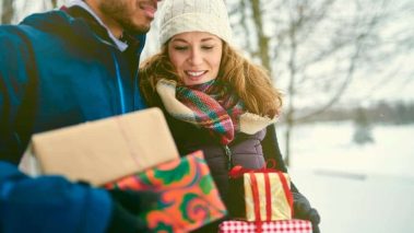 Smiling couple holding Christmas presents1 Christmas Sale: Grab 2 Cheap Dividend Stocks for Yields up to 6%!