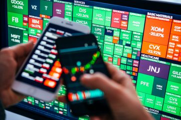 phone screens stock market European markets open sharply lower as EU countries impose sanctions on Russia