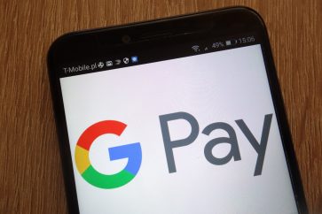 google pay logo on smartphone Crypto.com App launches in-app crypto purchase with Google Pay